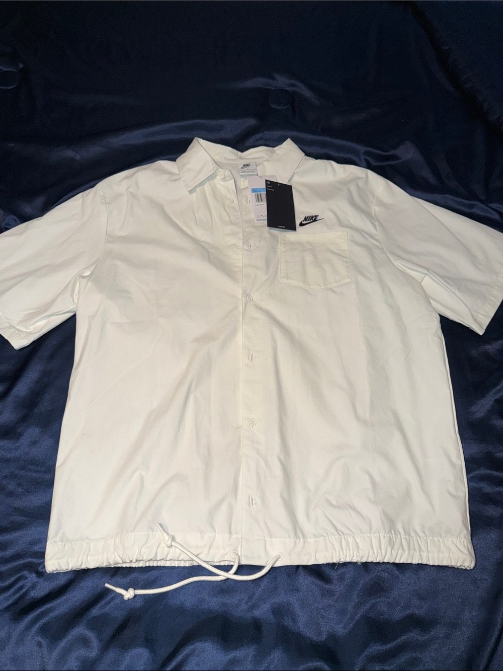 Nike White Short-Sleeve Button Down Shirt with Chest Pocket And String At Bottom
